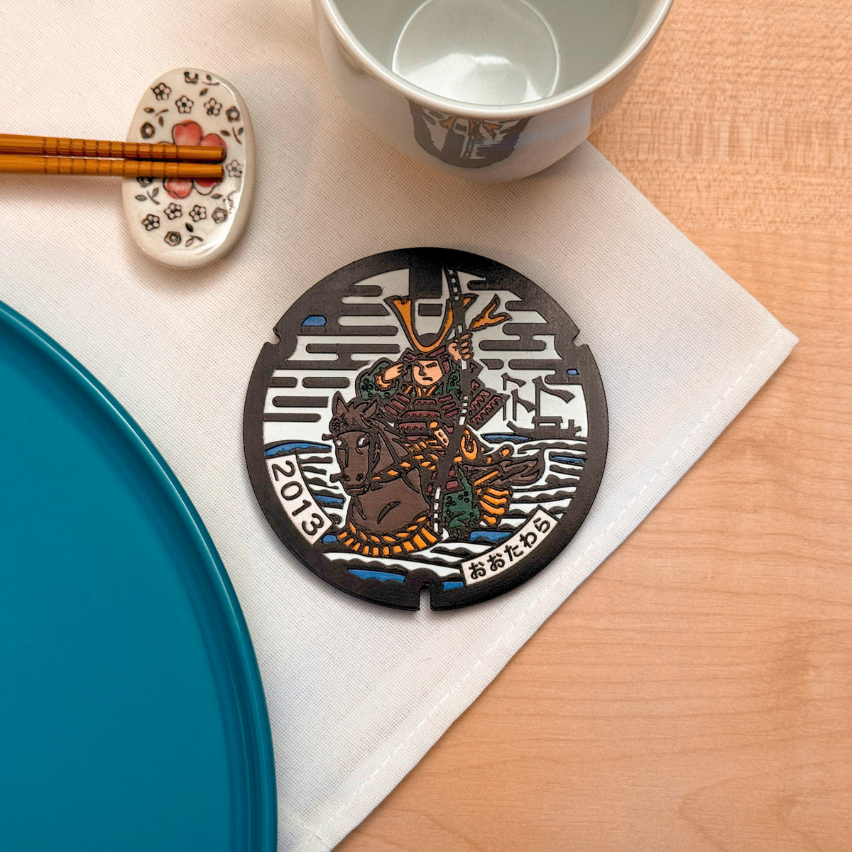 Sottobicchiere ROJI collezione Samurai con il design del tombino di Nasu no Yoichi, Otawara